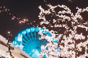 Christmas zone on Kontraktova Square with a Ferris wheel photo