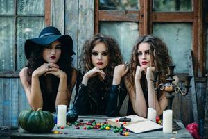 three witches at the table photo