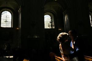 bride and groom illuminated by light photo