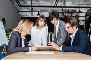 Business people having discussion, dispute at meeting or negotiations photo