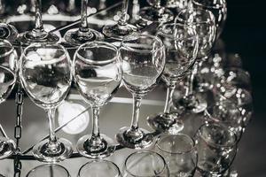 Beautiful chandelier made with glasses of wine photo