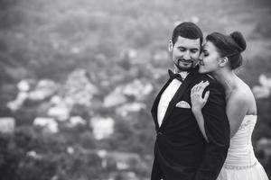 Wedding couple posing for the camera photo