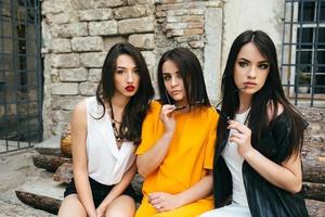 Three young beautiful girls photo