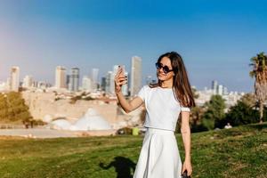 Young attractive woman taking selfie photo