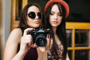 Two young beautiful girls photo