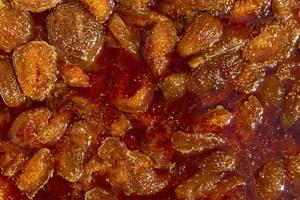 Fig jam close up, texture and pattern with boiled jam. Background. Soft focus. photo