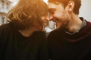 Vintage couple hugs and laughing .Coffee shop photo