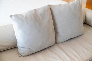 comfortable pillows on end of bed sofa photo