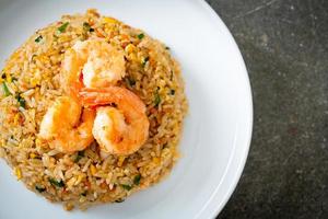 fried shrimps fried rice on plate photo