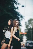 pretty girls posing in a city street photo