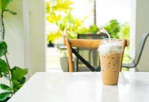 iced cappuccino coffee glass on table photo