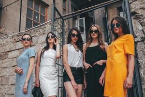 Five young beautiful girls in the city photo