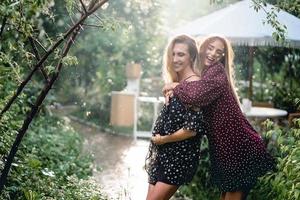 Two girls in a summer park photo