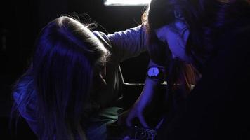 Woman and fortune teller with crystal ball photo