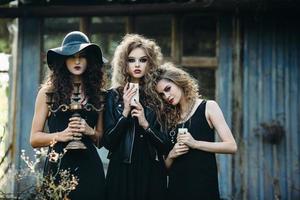 three vintage women as witches photo