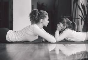 Mother and daughter have fun in the gym photo
