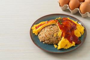 Flavored Fried Rice in an Omelet Wrapping photo