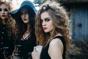 three vintage women as witches photo