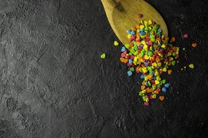 Sweets on a dark stone background photo