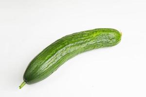 Fresh green cucumber isolated on white background photo