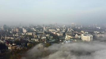 Aerial view of the city in the fog. photo