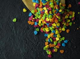 Sweets on a dark stone background photo