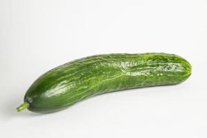 Fresh green cucumber isolated on white background photo