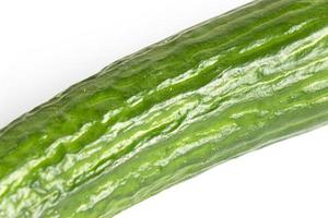 Fresh green cucumber isolated on white background photo