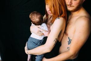 happy family on a black background photo