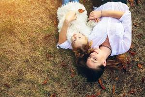 Mother and little daughter in a park photo