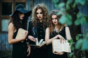 three vintage women as witches photo