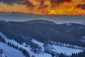 Sunset in a winter landscape photo