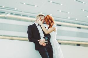 Wedding couple in a futuristic building photo