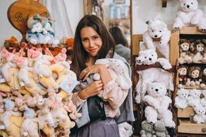 Young beautiful woman with little plush rabbit photo