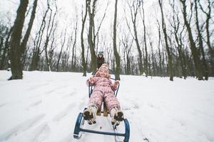 Mom with a little daughter in the park photo