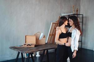 Two girls in each other's tender embraces photo