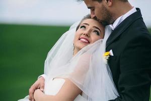 Beautiful wedding couple on nature photo