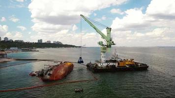 View of an old tanker that ran aground and overturned photo