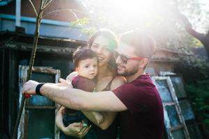 young family with a child on the nature photo