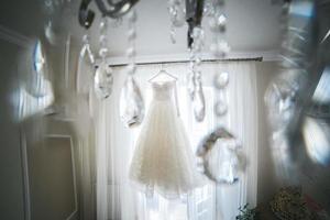 Wedding dress hanging photo