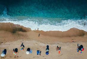 Beach with sun loungers on the coast of the ocean photo