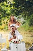 Young family with child at a picnic photo