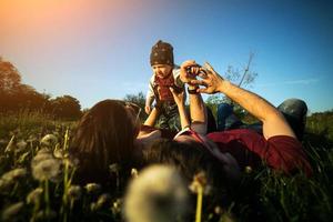 young family with a child on the nature photo