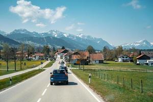 Car driving on the highway with mountains photo