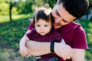 young family with a child on the nature photo