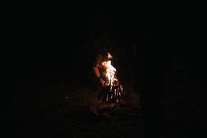 Beautiful fire in the forest on a black background. photo