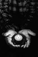 Hands and candle photo