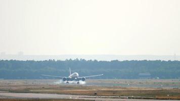 Widebody airplane landing in Frankfurt Airport video