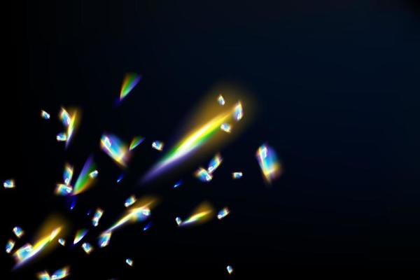 Rainbow highlights on a black background.Glare or reflection from water and glass.Glittering  particles for social media backgrounds, product presentations, photo shots.