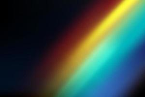 Rainbow highlights on a black background.Glare or reflection from water and glass.Glittering  particles for social media backgrounds, product presentations, photo shots. vector